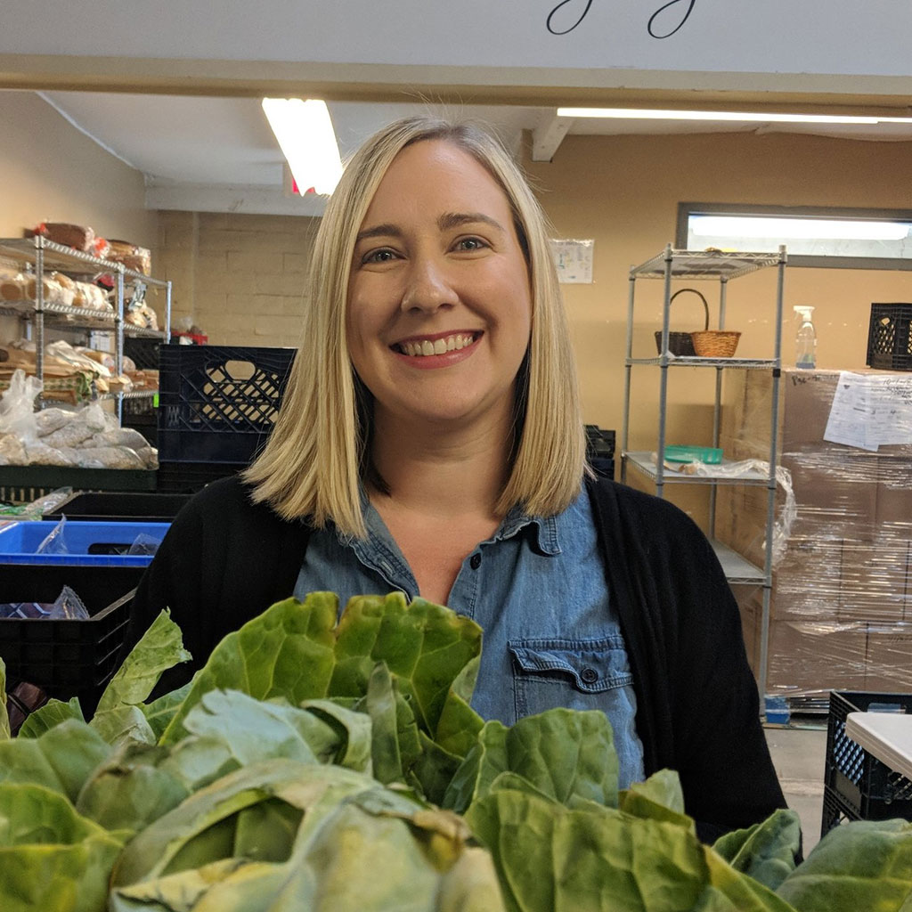 image of Erika holding vegetables